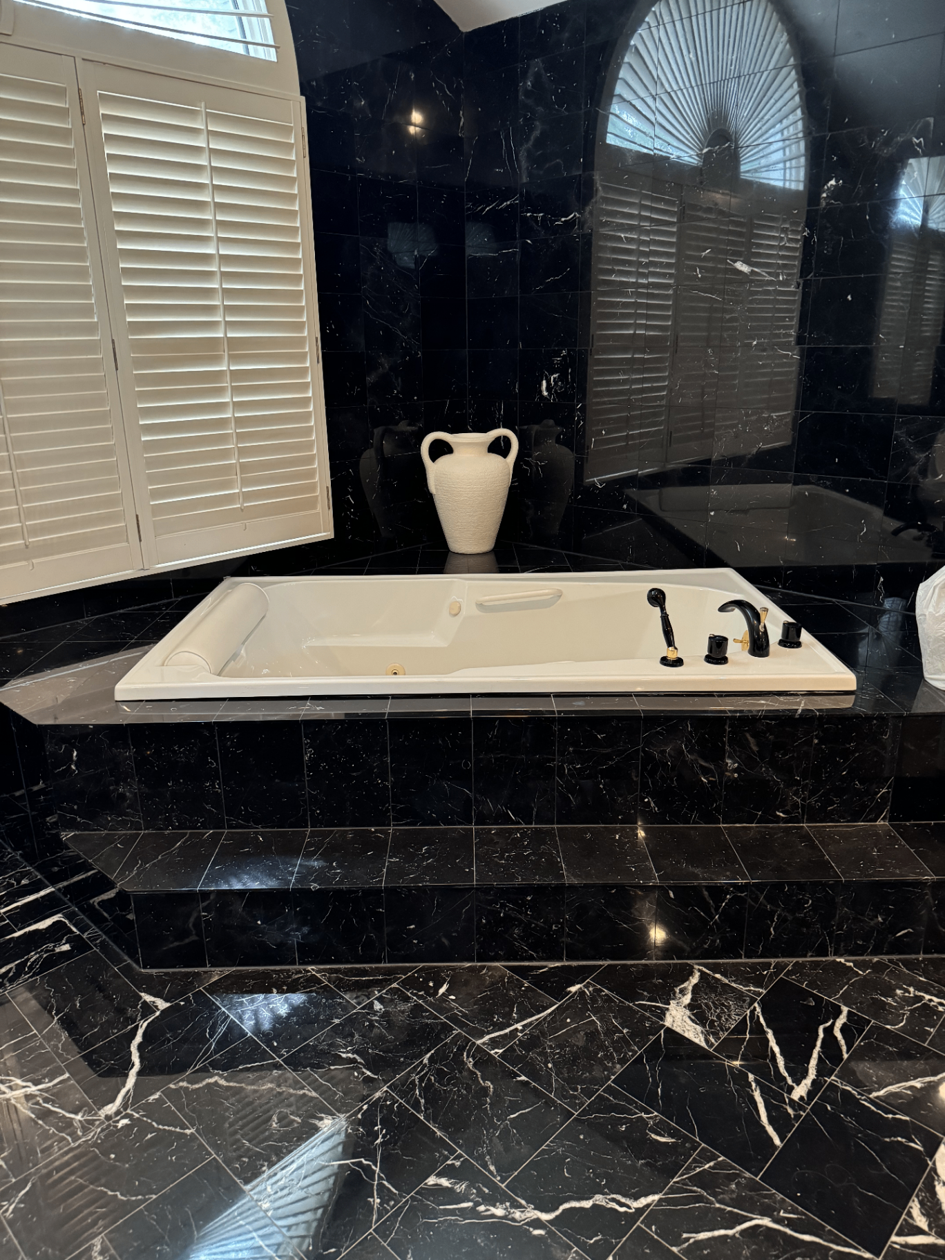 Marble vanity vessel sink and brass faucet in a Richmond Hill bathroom remodel
